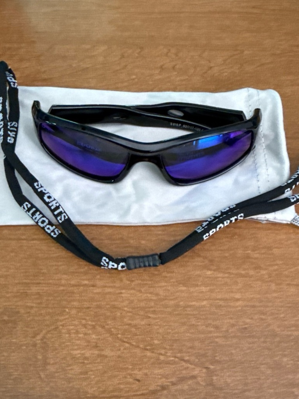 Sporty Black Sunglasses with Purple Mirrored Lenses
